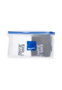 Ett par strumpor i en genomskinlig plastpåse med blå dragkedja. Det ena paret är vitt med svart text; det andra är svart med vit text.