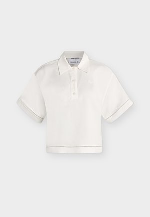 Valge lühikeste varrukatega lühikeseks lõigatud polo särk krae ja kolme nupuga, millel vasakul rinnal peen brändi logo.