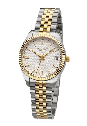 Montre en métal argenté et doré avec un cadran blanc texturé, marqueurs d'heure dorés, affichage de la date et un bracelet bicolore.