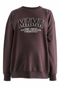 Brūns džemperis ar izšūtu "MAMA CLUB" baltā krāsā. Apaļais kakls, garas piedurknes, ribotie gali un hem, ar brīvu piegriezuma stilu. Mīksta auduma tekstūra.