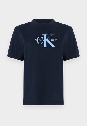 Navy blue cotton t-shirt with short sleeves, featuring the logo "Calvin Klein" in light blue and pink on the front. Simple crew neckline.