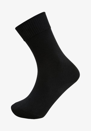 Czarna skarpetka typu crew z żebrowanym mankietem, gładką strukturą i dopasowanym kształtem, zaprojektowana z myślą o komforcie i trwałości.