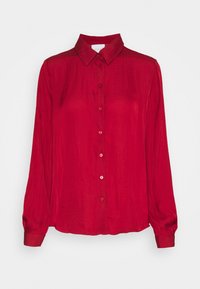 Červená košile s dlouhým rukávem a límečkem, vyrobená z hladkého, lehkého materiálu. Má rovný lem a odpovídající knoflíky.