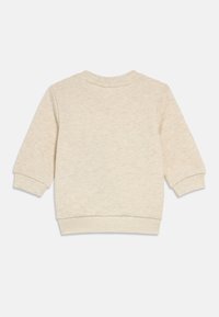 Hellbeiges Sweatshirt mit subtiler Textur, Rundhalsausschnitt sowie gerippten Bündchen an Ärmeln und Saum. Lange Ärmel mit lockerem Sitz. Keine sichtbaren Logos oder Muster.