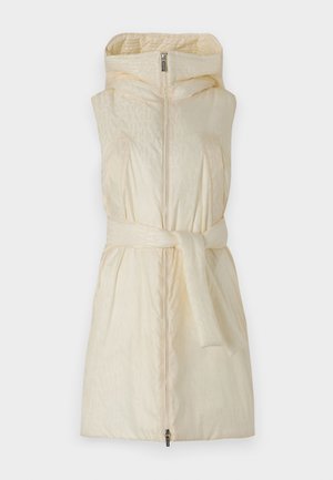 Padded sleeveless coat in light cream with a high collar, zip closure, and a fabric belt at the waist; features subtle embossed patterns.