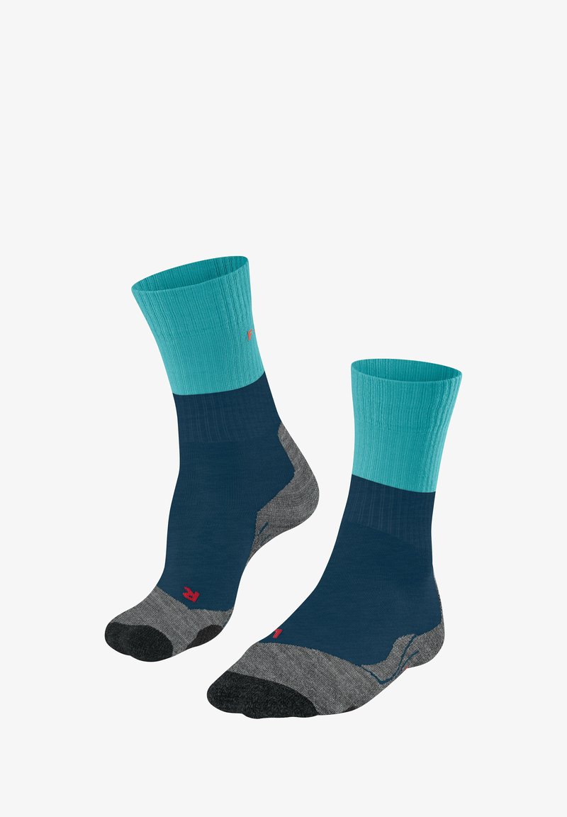 Türkis- und marineblaue Socken mit geripptem Bund, verstärktem grauem Fersen- und Zehenbereich, aus einem Textilmix für Komfort und Langlebigkeit.