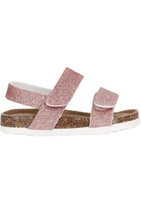 Sandalo rosa glitterato con due cinturini regolabili in Velcro, soletta in sughero, suola in gomma bianca e finitura glitterata testurizzata.