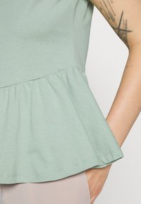 LASCANA Triko s potiskem - green