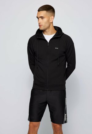 SAGGY - Sweater met rits - black