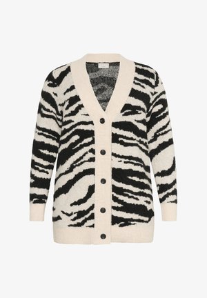 Kardigan w czarno-kremowy wzór zebry z dekoltem w serek, długimi rękawami, zapięciem na guziki oraz prążkowanymi detalami wokół dekoltu i hemu.