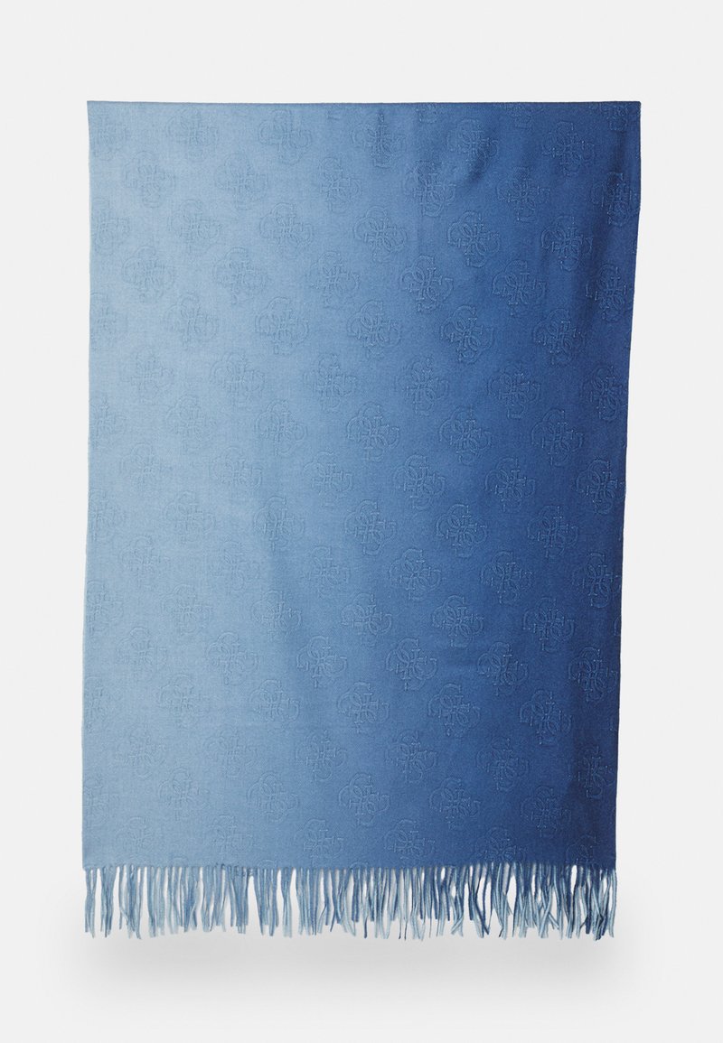 Manta de lanzamiento azul ombré con un patrón embosado sutil y bordes con flecos, confeccionada en material suave con tonos de azul variados.