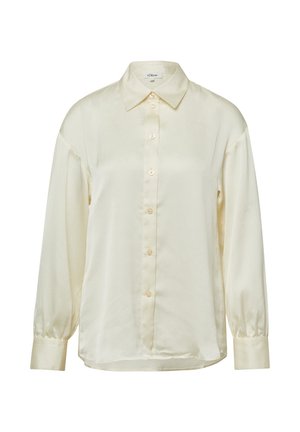 Crème kleurige langemouwen shirt met een zachte textuur, knoopsluiting voor, kraag en manchetten. Voorzien van subtiele patronen.