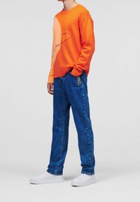 KARL LAGERFELD Stickad tröja - orange