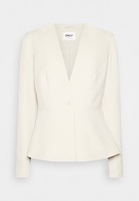 Blazer couleur crème avec un col en V profond, une fermeture à un seul bouton et une taille cintrée qui s'évase légèrement au bas. Manches longues ajustées.