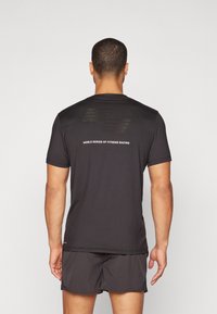 Puma - HYROX TEE - Športne majice - black Miniaturna slika 1