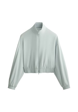 Hellblau kurzer Blazer aus weichem, glattem Stoff. Besitzt einen hohen Kragen, einen Reißverschluss vorn sowie elastische Bündchen und Saum.