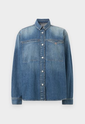 Sinine teksariidest nupuga särk pika varrukaga, kahe eesmise rinnataskuga ja allapoole volditud kraega, näidates tuhmunud pesuvärvi efekti.