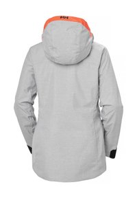Šedá voděodolná bunda s texturovaným povrchem, s oranžovým lemem kapuce a černými detaily na manžetách. Součástí je nastavitelné kapuce.