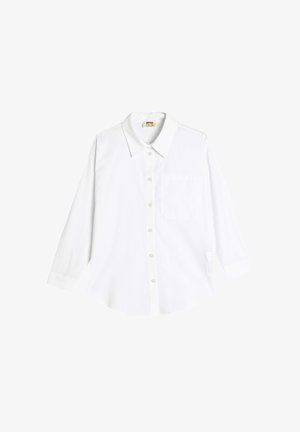 Witte lange mouwen shirt van katoen, met een knoopsluiting aan de voorkant, een puntige kraag en een enkel borstzakje. Glad textuur en een ontspannen pasvorm.