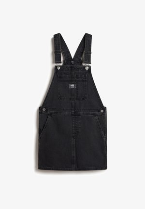 Robe salopette en denim noir avec bretelles réglables, poche poitrine avant avec logo Vans et poches latérales.