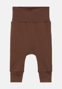 Brune myke stoff babybukser med bred midjeelastikk og mansjetter, designet for komfort og stretch.