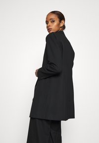 JUST FEMALE WATSON - Casaco curto - black