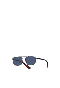 Occhiali da sole con montatura metallica rettangolare, lenti blu, aste nere e dettagli in gomma rossa sulle tempie. Design leggero.