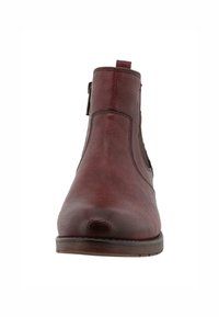 Burgundin värinen nahkainen nilkkaboots, jossa on sileä pinta, pyöreä kärki, sivuvaellusvetoketju ja matala puinen korko. Minimalistinen muotoilu ilman näkyviä kuvioita.