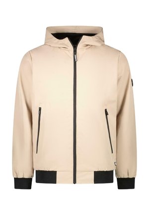 Beige lichtgewicht jack met een capuchon, voorrits en twee zijvakken. Zwarte accenten bij de manchetten en de zoom. Gladde, gestructureerde stof.