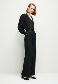 adL WIDE LEG  - Broek - black