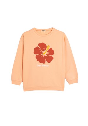 Sweatshirt pêche avec un grand design de fleur d'hibiscus rouge et des accents jaunes, col rond et manches longues. Tissu en coton doux.