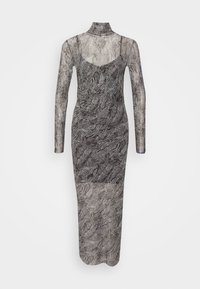 Pitkähihaisessa, korkealla kauluksella varustetussa mekossa on läpinäkyvä, kuvioitu kangas, jossa on musta-valkoinen kasvi- tai lehtikuosi; slim-fit-malli.