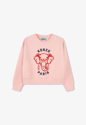Sweatshirt rose avec un graphique d'éléphant en rouge et bleu marine, avec le texte "KENZO PARIS" en dessous. Matière douce avec des poignets côtelés.