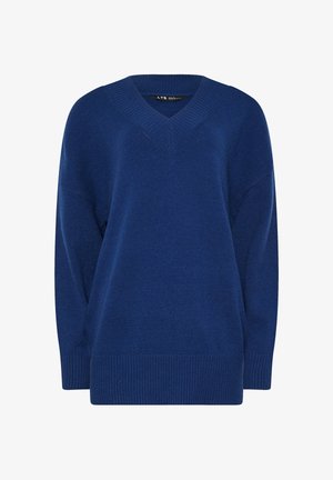 Maglione blu oversize con scollo a V, polsini e orlo a coste. Tessuto morbido, maniche lunghe e vestibilità rilassata. Adatto per un look informale.