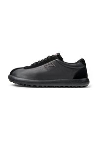 Black leather sneaker with textured surface, lacing, cushioned sole, and subtle branding. Features a rounded toe and black accents.