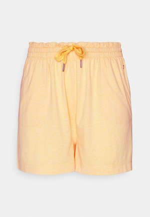 Soft, light yellow cotton shorts with an elastic waistband, adjustable drawstring, and two side pockets. Smooth texture, casual design.