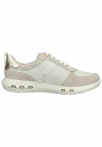 Sneakers with a soft beige suede and mesh upper, white laces, metallic gold accents on the heel, and a textured white sole with hexagonal details.