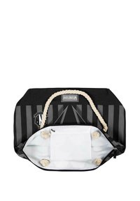 Sac fourre-tout noir rayé avec un intérieur blanc et des poignées en corde crème. Dispose d'une poche zippée et d'accents noués à l'intérieur.