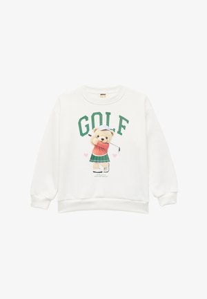 Sweatshirt blanc avec un graphique d'un ours en tenue de golf, avec le texte vert "GOLF" et un détail de cœur rose. Tissu confortable et doux.
