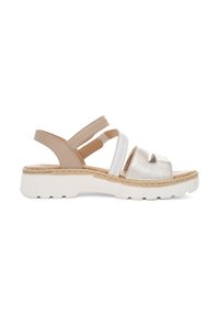 Women's sandals with a white and metallic silver design, featuring cross straps in beige and white, on a chunky white sole with textured accents.