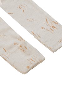 Brede gebreide leggings in lichtbeige met een subtiel patroon van gouden botanische illustraties, voorzien van een zachte textuur en een aansluitend ontwerp.