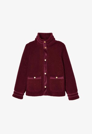 Burgunderfarbene Fleecejacke mit hohem Kragen, satinähnlichen Besätzen, goldenen Knopfverschlüssen und zwei Fronttaschen. Weicher Stoff mit gerippten Bündchen.