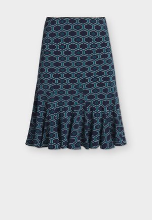 Námornícka sukňa áčkového strihu s tyrkysovým a bielym vzorom hexagónov a rozšíreným volánovým lemom.