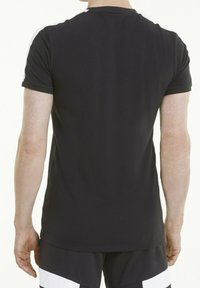 Black short-sleeve t-shirt with a round neckline, featuring white accents on the shoulder, made of smooth, stretchable fabric.