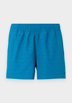 Blue athletic shorts with textured wave pattern and elastic waistband, featuring a small black Nike swoosh on the bottom right leg.