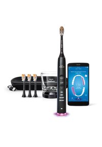 Brosse à dents électrique Philips Sonicare, noire, avec trois têtes de rechange, verre de charge, étui de voyage et application smartphone affichant des données dentaires.