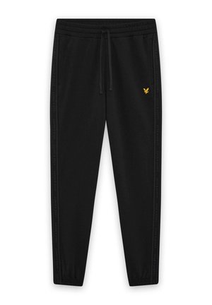 Zwarte joggingsbroek met elastische boorden, taille met trekkoord, zijstrepen met tekst en een klein geel vogel logo op de linker dij.