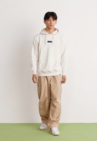 Ellesse VARI - Mikina s kapucňou - oatmeal marl