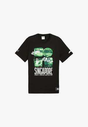 Czarna koszulka Puma z zielonkawymi scenami z Grand Prix Singapuru, samochodami Formuły 1 oraz napisem "SINGAPORE Formula 1 Grand Prix Singapur 2025."