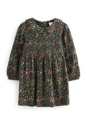 Robe d'enfant à manches longues vert foncé avec smocks, motif floral rose, jaune et orange, et col rond style Peter Pan.